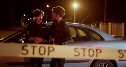 Horizontal video: Men standing by car at night behind tape 10481005. Duration: 17 seconds. Resolution: 4096x2160