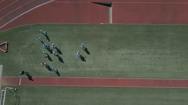 Horizontal video: Aerial view of soccer practice on outdoor field 28870859. Duration: 58 seconds. Resolution: 3840x2160