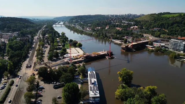 Horizontal video: Aerial view of river and city landscape 28890001. Duration: 9 seconds. Resolution: 3840x2160