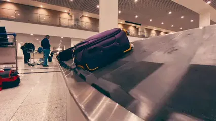 Horizontal video: Footage of people waiting for their luggage 3747855. Duration: 10 seconds. Resolution: 3840x2160