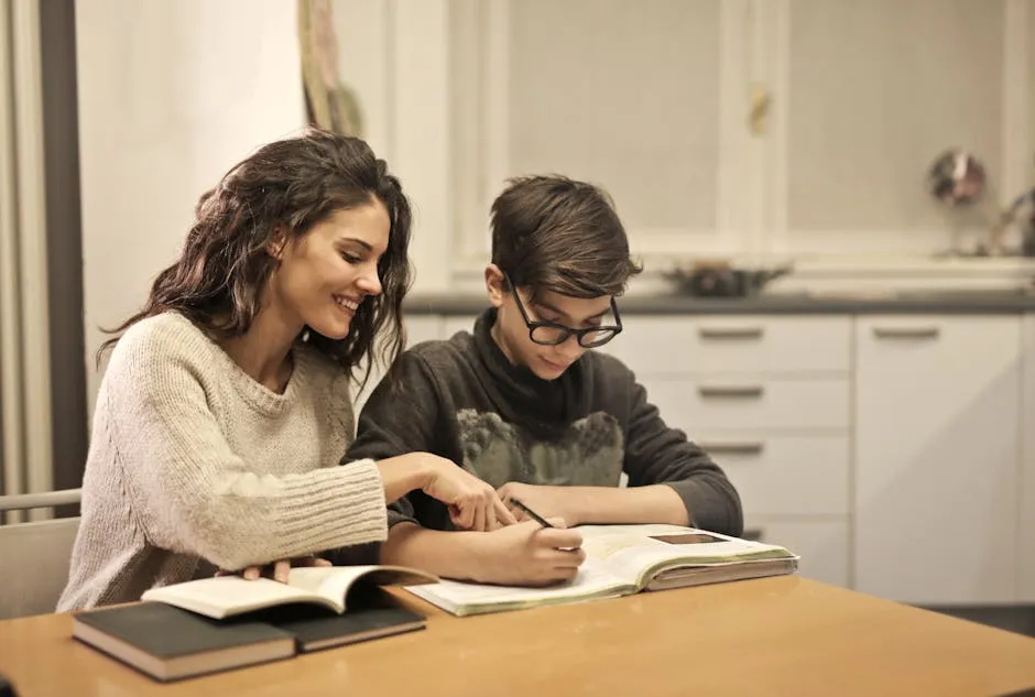 Elder sister and brother studying at home