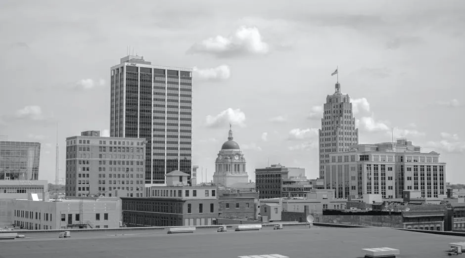 Grayscale Photo of City Buildings