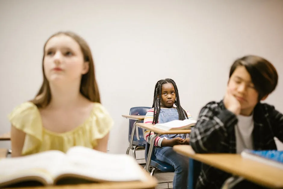 A Girl Sitting Lonely by Herself in the Classroom