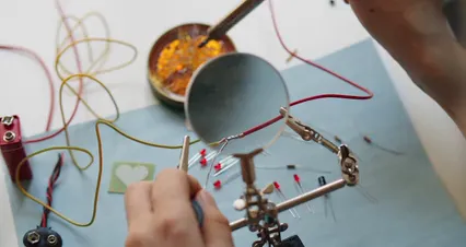 Horizontal video: Person using soldering iron on electrical wires 7314029. Duration: 15 seconds. Resolution: 4096x2160