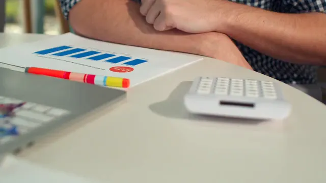 Horizontal video: A person using a calculator 7687708. Duration: 12 seconds. Resolution: 3840x2160