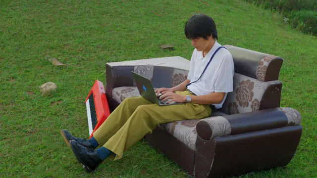 Horizontal video: Young man working outdoors on laptop 28701303. Duration: 15 seconds. Resolution: 1920x1080