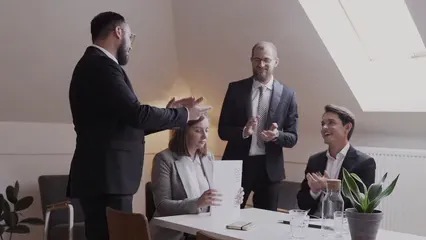 Horizontal video: People shaking hands and celebrating 5520035. Duration: 13 seconds. Resolution: 3840x2160