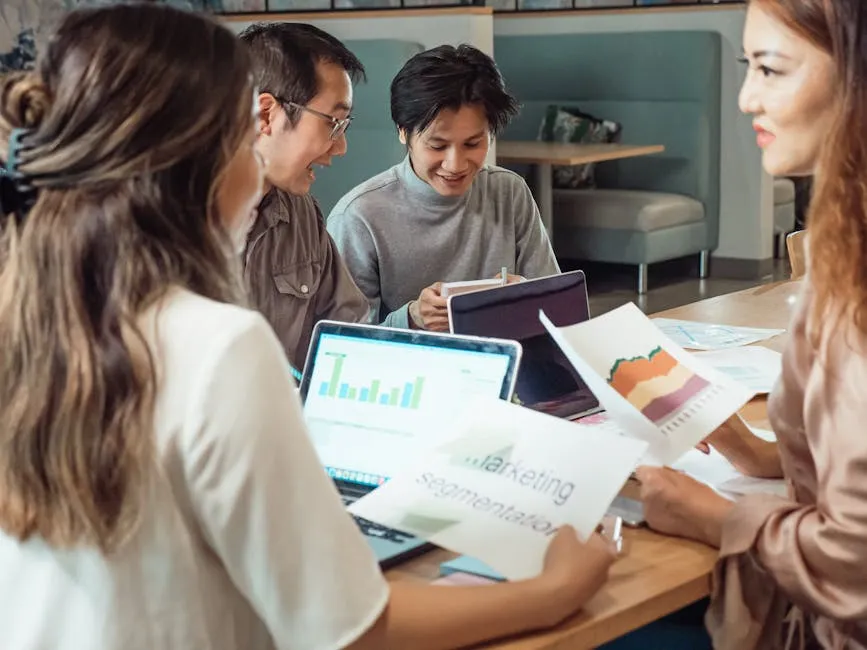 A Group of People Having a Meeting in the Office