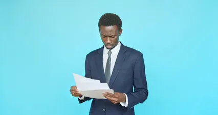 Horizontal video: A businessman looking at documents 9465173. Duration: 30 seconds. Resolution: 4096x2160