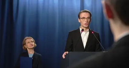 Horizontal video: A man in a black suit giving a speech 11336628. Duration: 12 seconds. Resolution: 4096x2160
