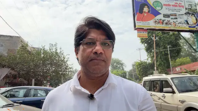 Horizontal video: Street interview with man in busy indian market 29146998. Duration: 29 seconds. Resolution: 1920x1080