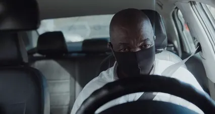 Horizontal video: A man in a mask driving a car 4607901. Duration: 19 seconds. Resolution: 4096x2160