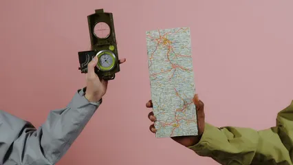 Horizontal video: A geological compass and a map 7010148. Duration: 23 seconds. Resolution: 3840x2160