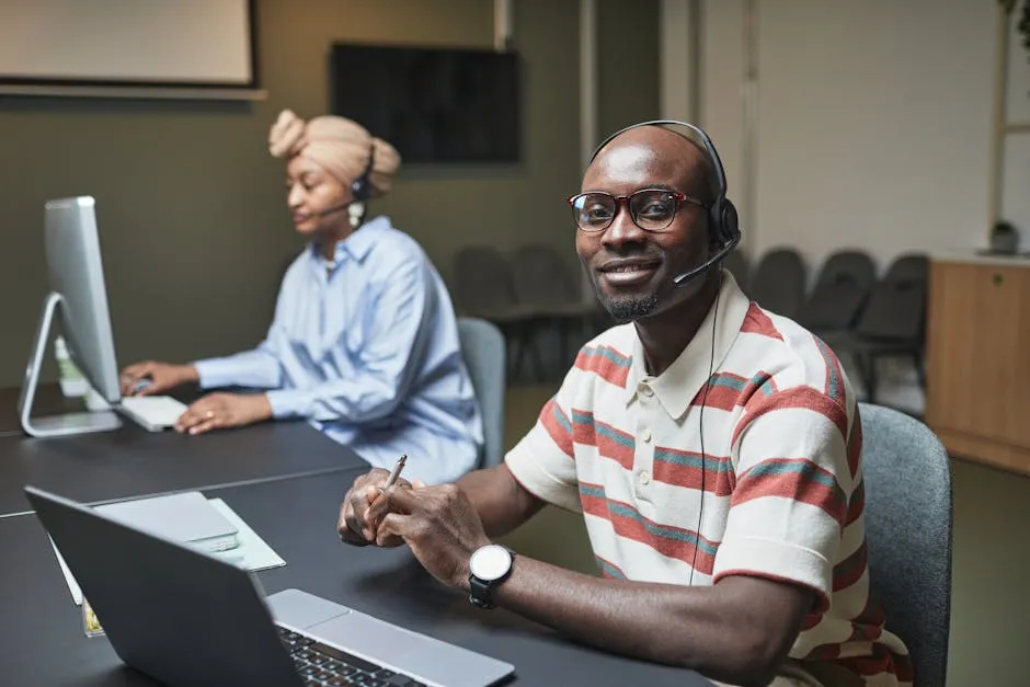 Woman and Man Working in Call Center Office