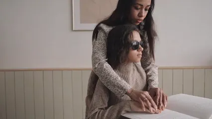 Horizontal video: Blind woman reading 7694234. Duration: 10 seconds. Resolution: 1920x1080