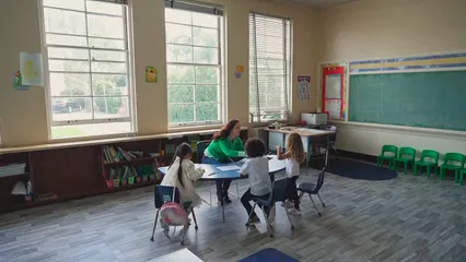 Horizontal video: A woman talking to children 8363907. Duration: 13 seconds. Resolution: 1920x1080