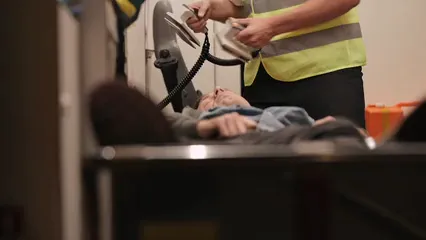 Horizontal video: Paramedic using a manual external defibrillator 8944428. Duration: 15 seconds. Resolution: 1920x1080
