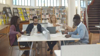 Horizontal video: Teacher with students at the library 5940314. Duration: 14 seconds. Resolution: 3840x2160