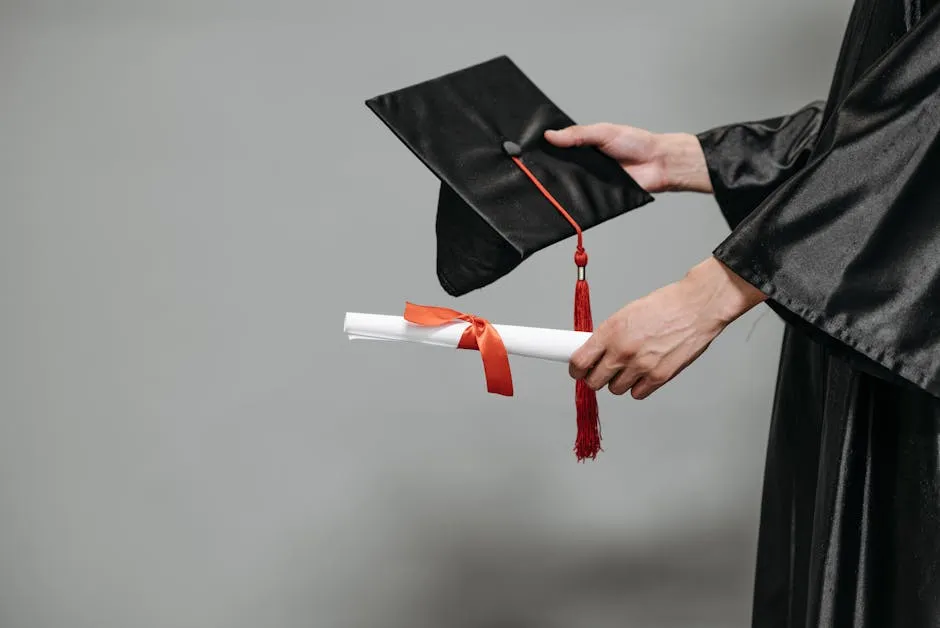 Photo of Person Holding Graduation Cap and Diploma