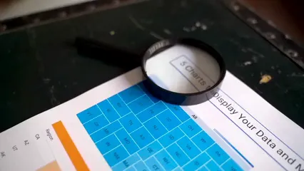 Horizontal video: Graphs and charts printed on paper 7947449. Duration: 13 seconds. Resolution: 1920x1080