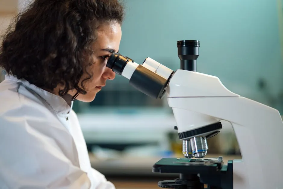 A Woman Looking at a Microscope