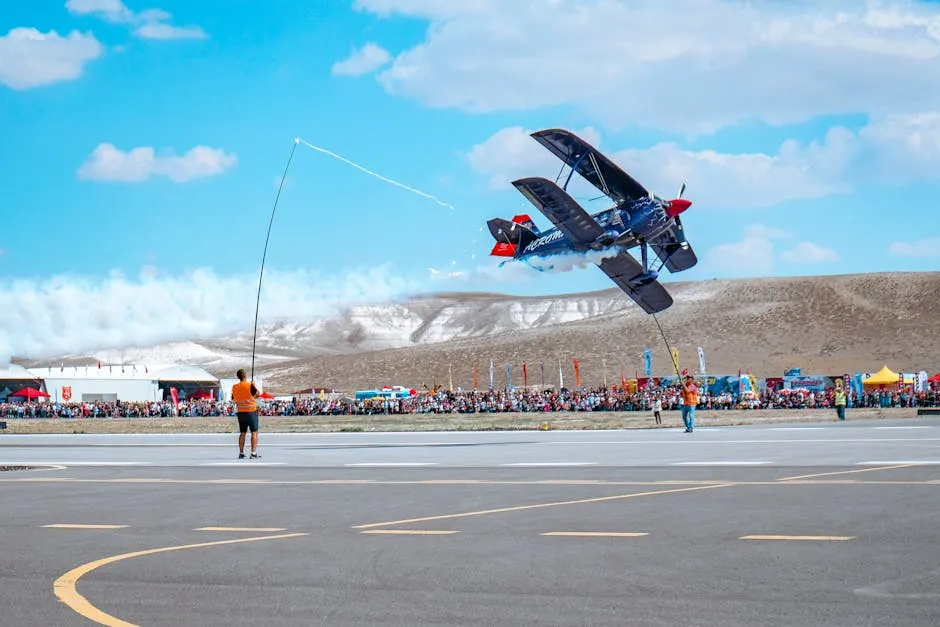 People Watching an Airplane at an Air Show 