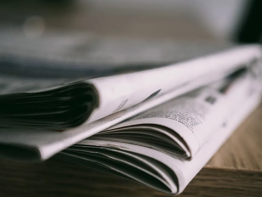 Close-up of Newspapers on Wooden Table