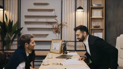 Horizontal video: Lawyer shaking his customers hands 8061614. Duration: 24 seconds. Resolution: 3840x2160