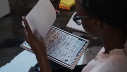 Horizontal video: Woman checking resume and writing down the points 5923961. Duration: 9 seconds. Resolution: 1920x1080