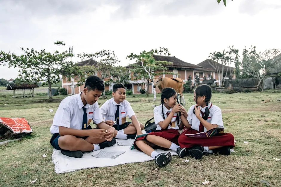 A Group of Students Sitting on the Field