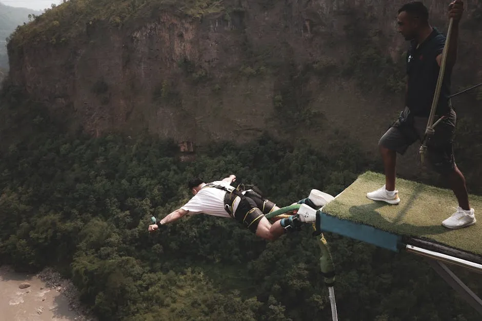 Man Jumping Bungee over River