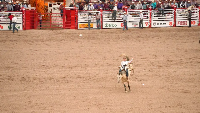 Horizontal video: Two people riding horses in a rodeo arena 27615148. Duration: 18 seconds. Resolution: 1920x1080