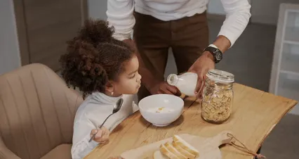 Horizontal video: Father serving breakfast to little girl 6031734. Duration: 21 seconds. Resolution: 4096x2160