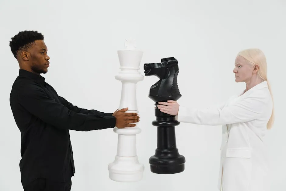 Man and Woman Holding a Giant Chess Piece