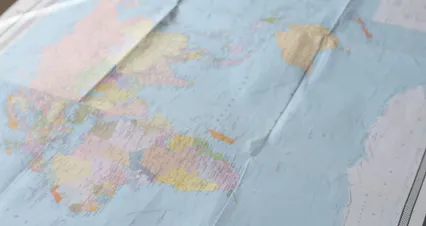 Horizontal video: World map on a smartphone screen 7431508. Duration: 30 seconds. Resolution: 4096x2160