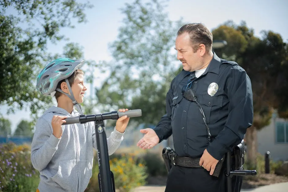 A Boy Talking to a Police Officer