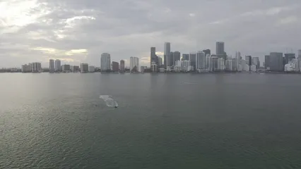 Horizontal video: Aerial footage of city near the ocean 9431776. Duration: 11 seconds. Resolution: 2688x1512
