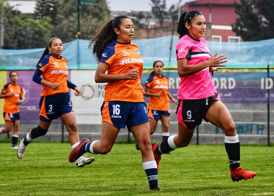 Running Women Players on a Pitch