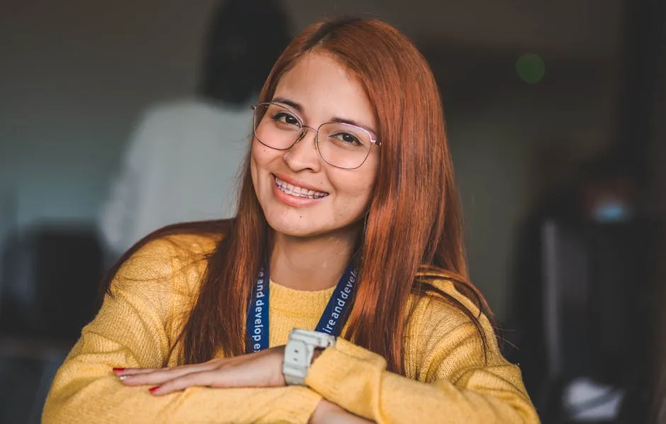 Portrait of a Smiling Woman Wearing Eyeglasses 