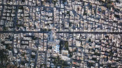 Horizontal video: An aerial view of a city with many buildings 19906107. Duration: 23 seconds. Resolution: 3840x2160