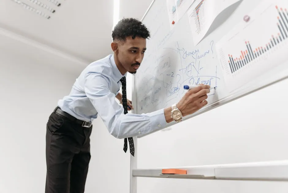 Man Writing on Whiteboard