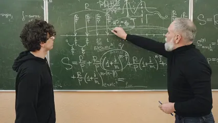 Horizontal video: Student and teacher solving an exercise 8197037. Duration: 11 seconds. Resolution: 1920x1080