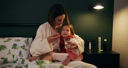 Horizontal video: A mom giving her child medicine 8375451. Duration: 35 seconds. Resolution: 4096x2160