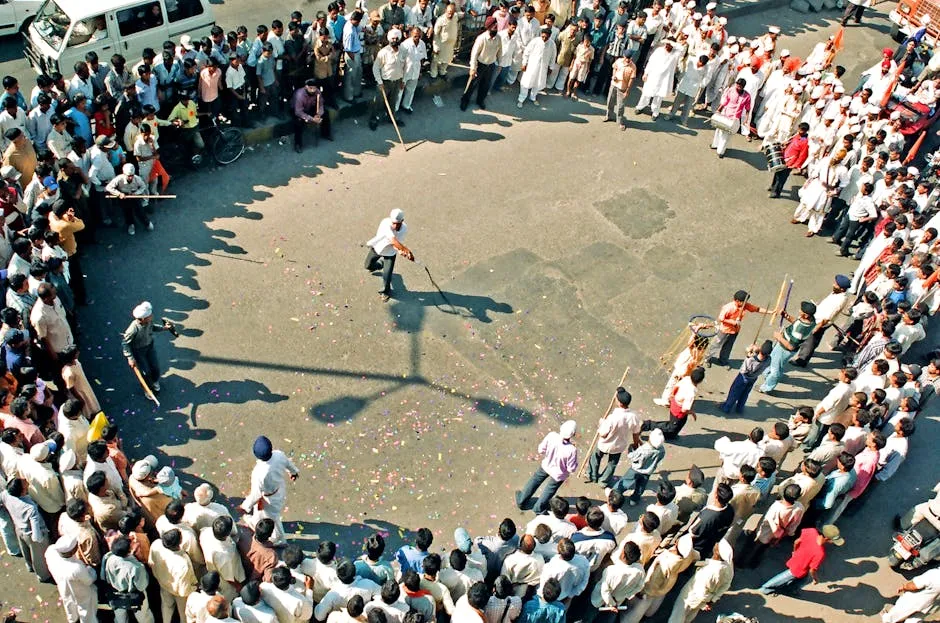 Man Performing on a Street Among Crowd 