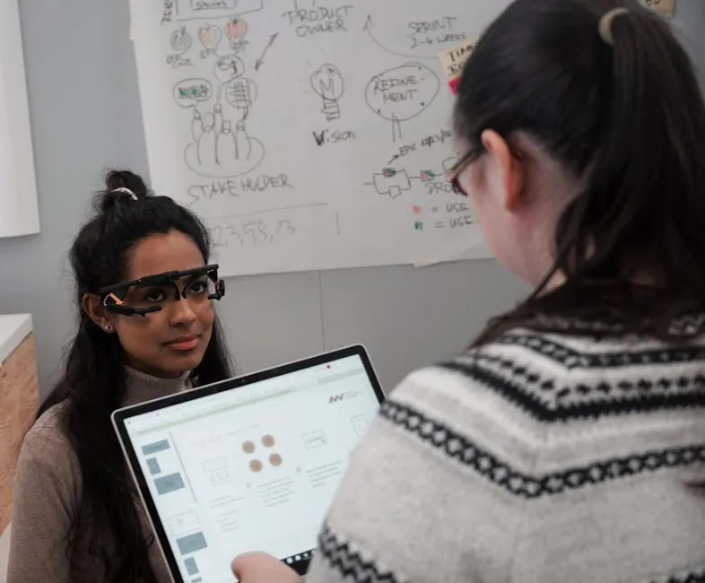 Women with Laptop and in Eyeglasses for Research