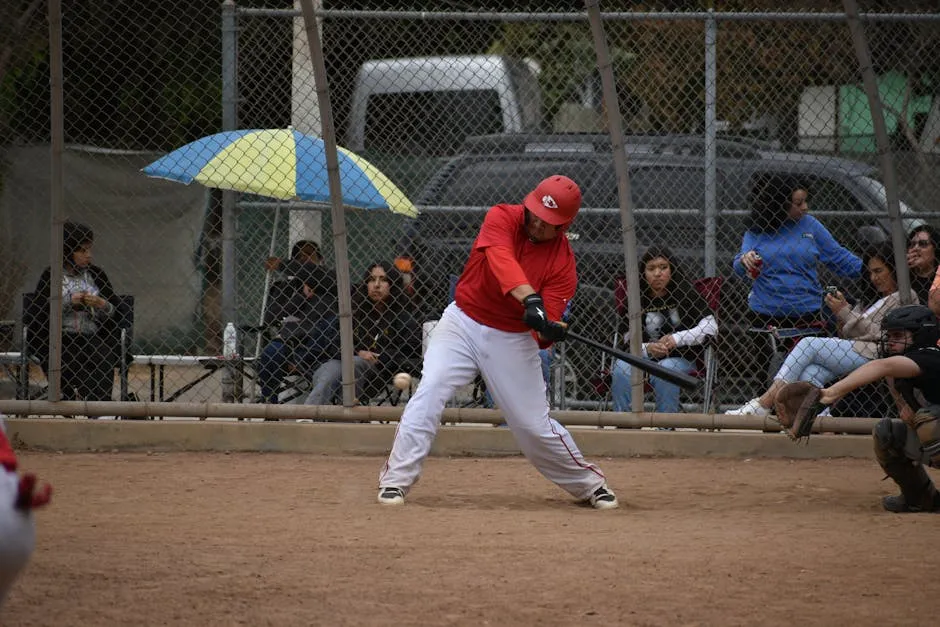 Batter Swinging the Bat during a Baseball Game