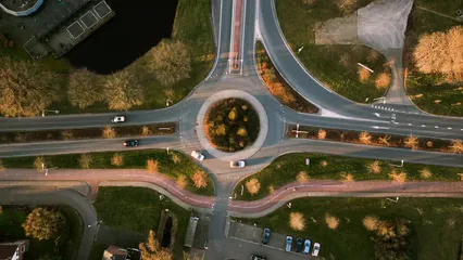 Horizontal video: An aerial view of a roundabout with cars 20488146. Duration: 38 seconds. Resolution: 3840x2160