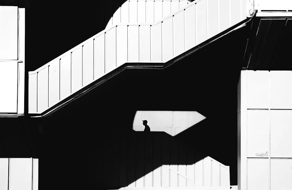 Silhouette of Man behind Wall on Stairs