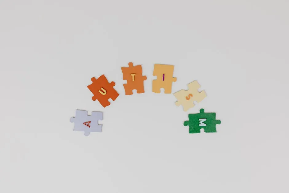 Autism Made of Puzzles on White Background