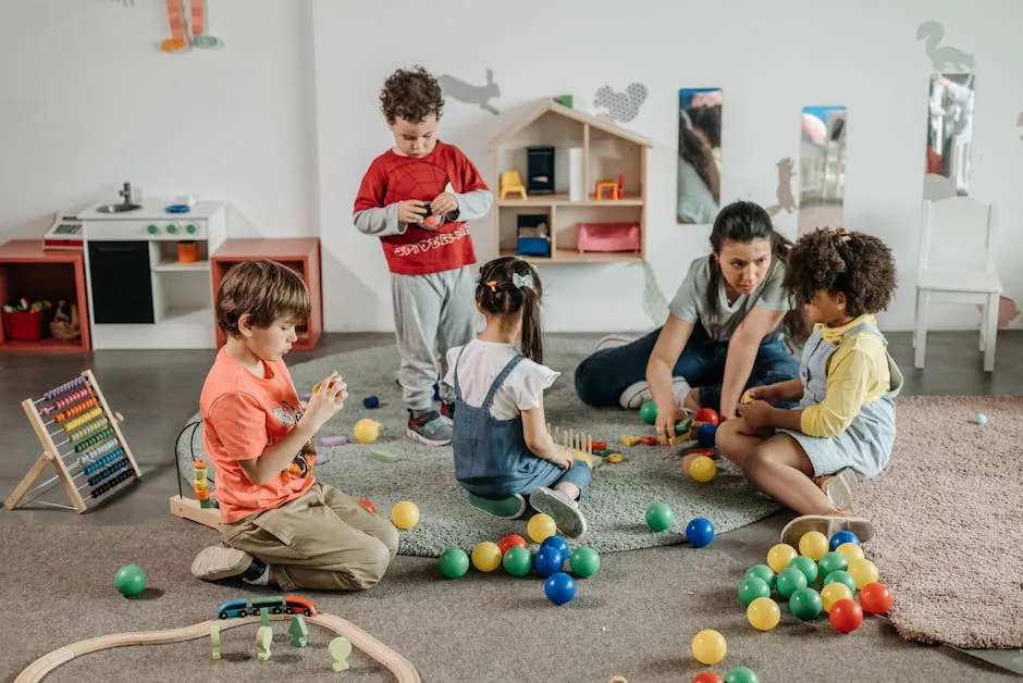 Kids with their Teacher Playing on the Floor